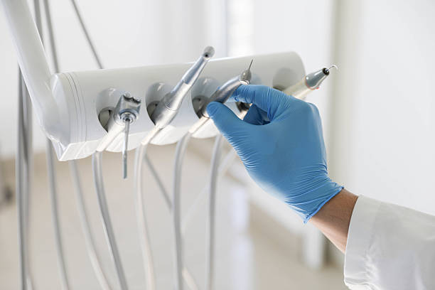 Professional Tooth Extraction technician working in Roanoke, IN